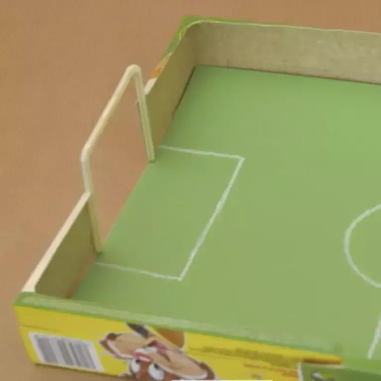 How to make a football game out of a cereal box?