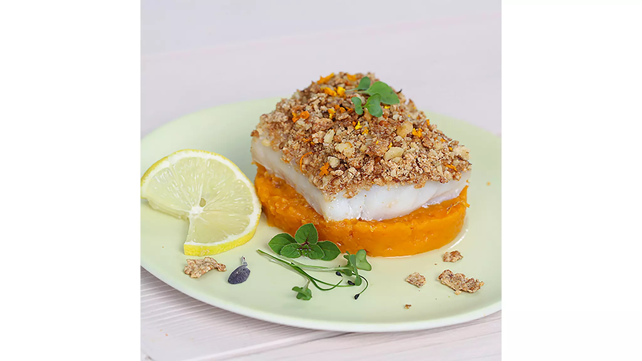 Rodaja gruesa de bacalao con puré de camote