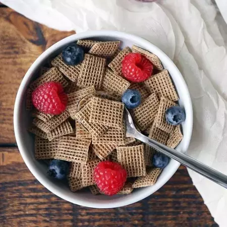 Shreddies bowlshot with Raspberries and Blueberries