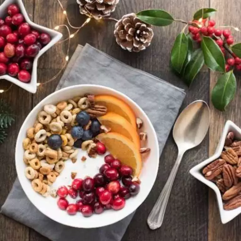 Bowl of Cheerios cereal with fruit toppings