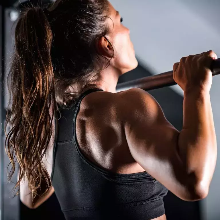 Woman doing pull ups