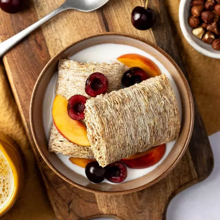 Bowl of Shredded Wheat with fruity toppings