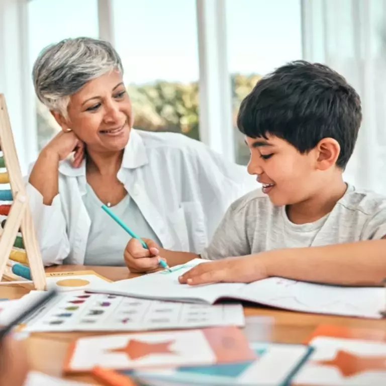Grandparent with child learning