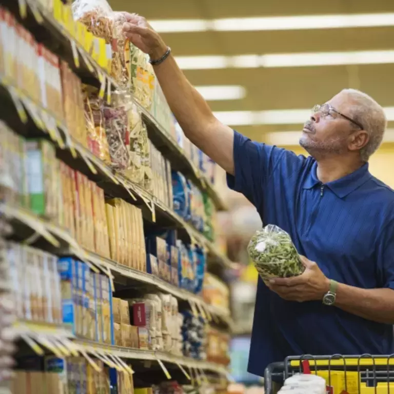 Man grocery shopping