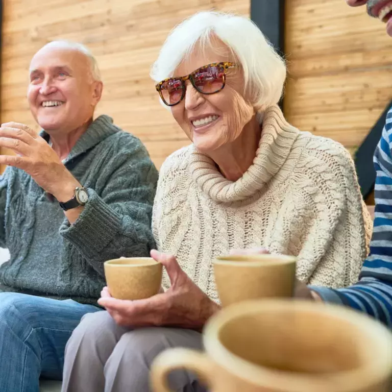 Friends enjoying a relaxing Sunday morning with coffee