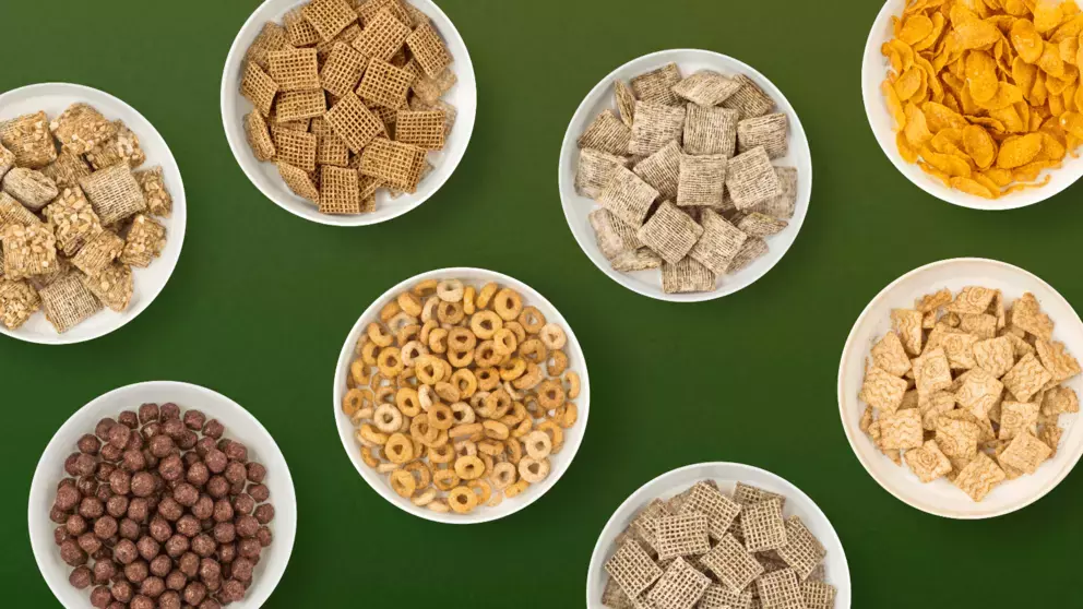 Variety of cereal bowls on a green background